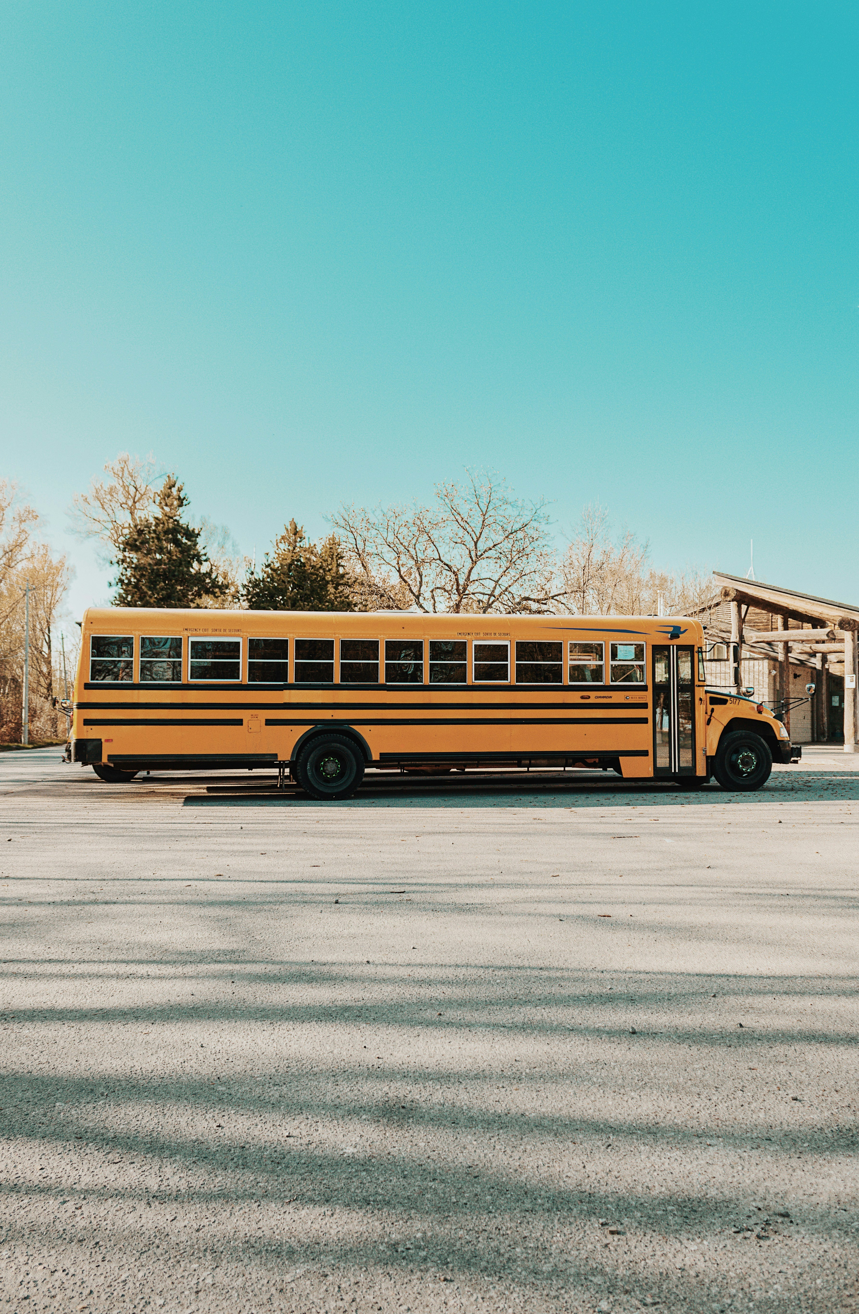 Yellow school bus parked, back to school season